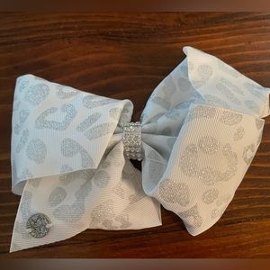 Jojo Siwa signature collection White Leopard Bow hair clip.